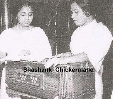 Asha rehearsals a song with Usha Khanna
