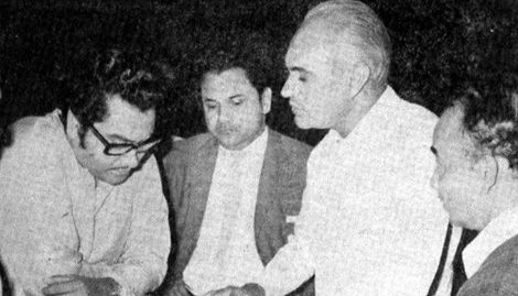 Kishoreda rehearsalling a song with OP Nayyar, Indivar & others