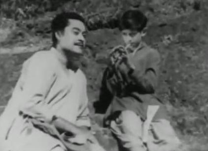 Kishoreda with Amit Kumar in a film scene