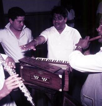 Pyarelal directing musicians to play flute alongwith Laxmikant in the recording studio 