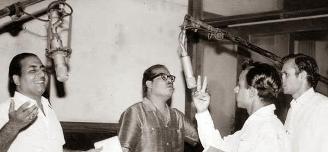 Mohdrafi singing duet with Mannadey and with Kalyanji Anandji in the recording studio