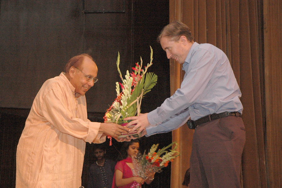 Mr. Severyn Kharchuk facilitating Ustad Faiyaz Khan (Tabla) with flower