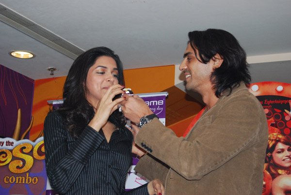 Deepika Padukone and Arjun Rampal during Fame announcement Om Shanti Om Competition Winner 