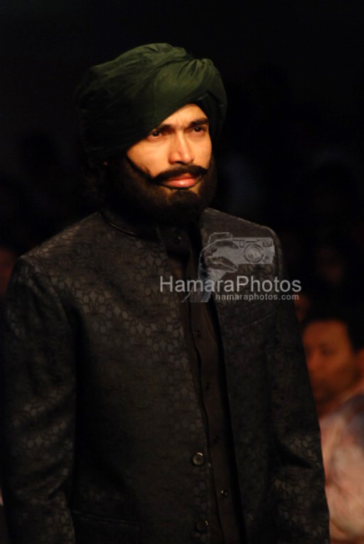 Model walks on the ramp for Narendra Kumar Ahmed Show in Lakme Fashion week on April 2nd 2008