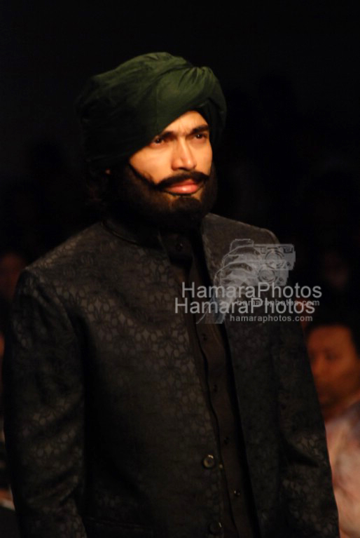 Model walks on the ramp for Narendra Kumar Ahmed Show in Lakme Fashion week on April 2nd 2008