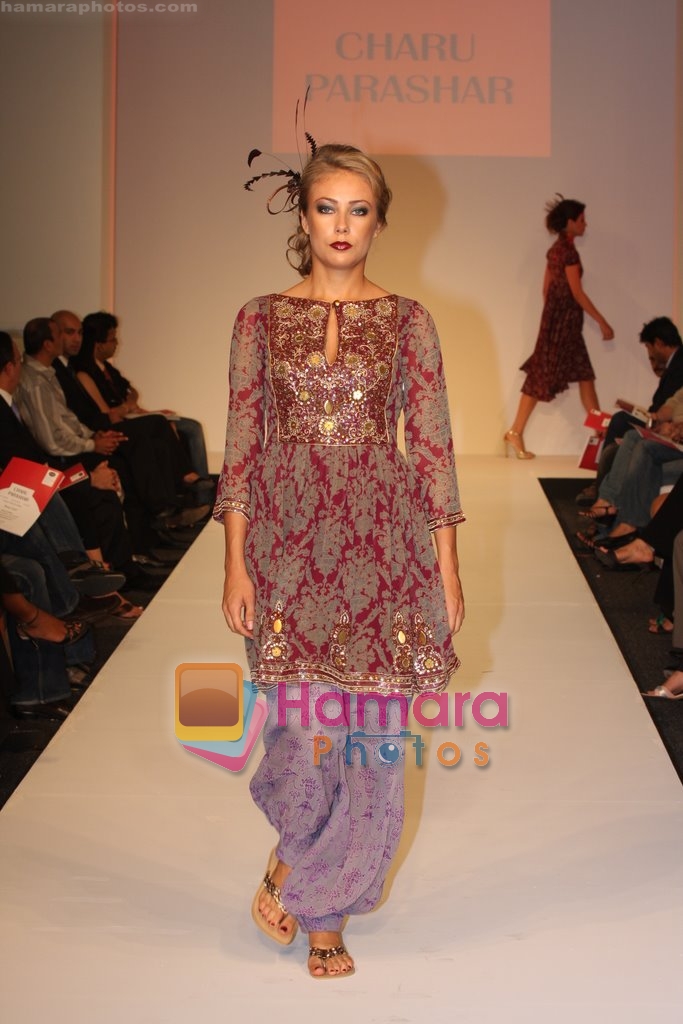 Model showcasing Charu Parashars Luxurious line of designer collection at Dubai Fashion Week 