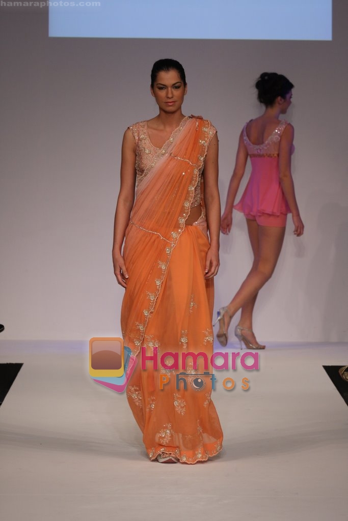 Model showcasing Rohit Mittals Luxurious line of designer collection at Dubai Fashion Week on April 11th 2008 