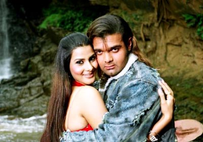 Mimoh and Pooja in a still from movie  Jimmy