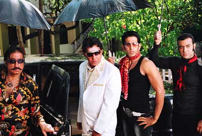 Shakti Kapoor and Mithun Chakraborty in a still from the movie Don Muthuswami