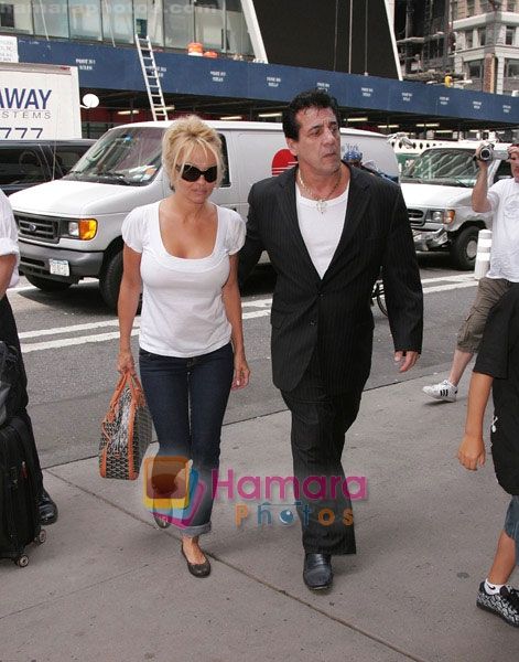 Pamela Anderson, Chuck Zito and Dylan Lee visit ESPN Zone on July 31, 2008 in New York City 