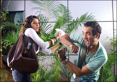 Ranvir Shorey, Mallika Sherawat in a still from UGLY AUR PAGLI 