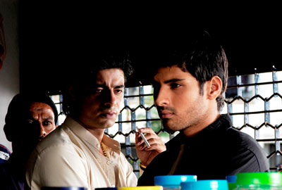 Sushant Singh and Sameer Dattani (R) in a still from the movie Mukhbiir