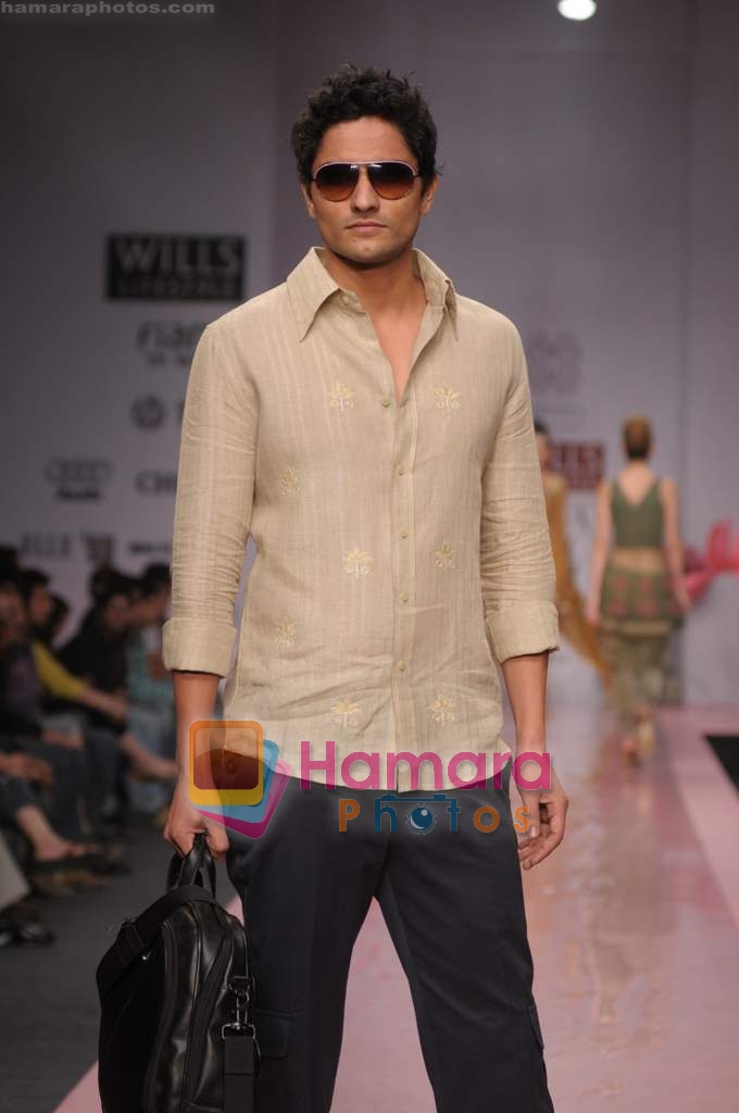 Models showcasing designs of Ashish, Viral and Vikrant during Wills Fashion Week on Oct 19, 2008 
