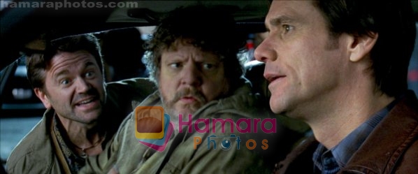 Jim Carrey, Brent Briscoe, John Michael Higgins in still from the movie Yes Man