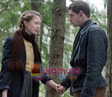 Jamie Bell, Mia Wasikowska in still from the movie Defiance