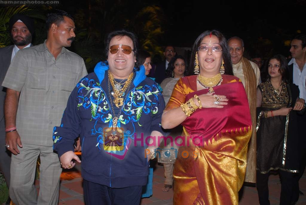 Bappi Lahiri with wife at Ambika Hinduja wedding reception to Raman on 11th Feb 2009 