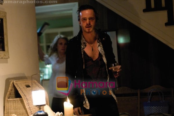 Monica Potter, Aaron Paul in still from the movie The Last House on the Left