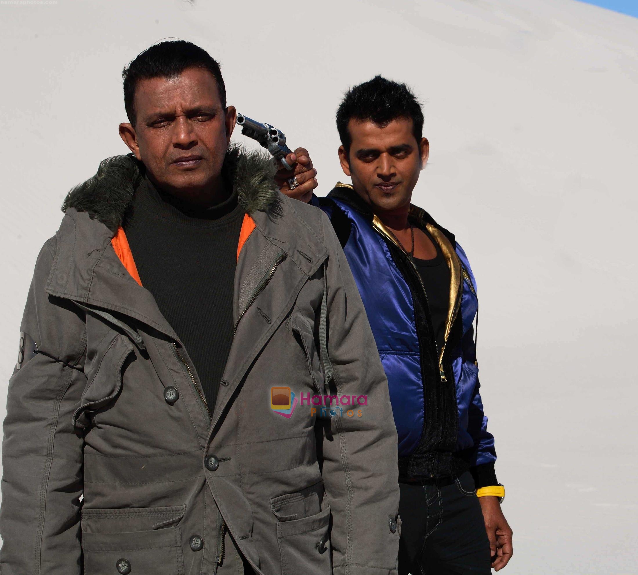 Mithun and Ravi Kisshen in the still from movie Luck