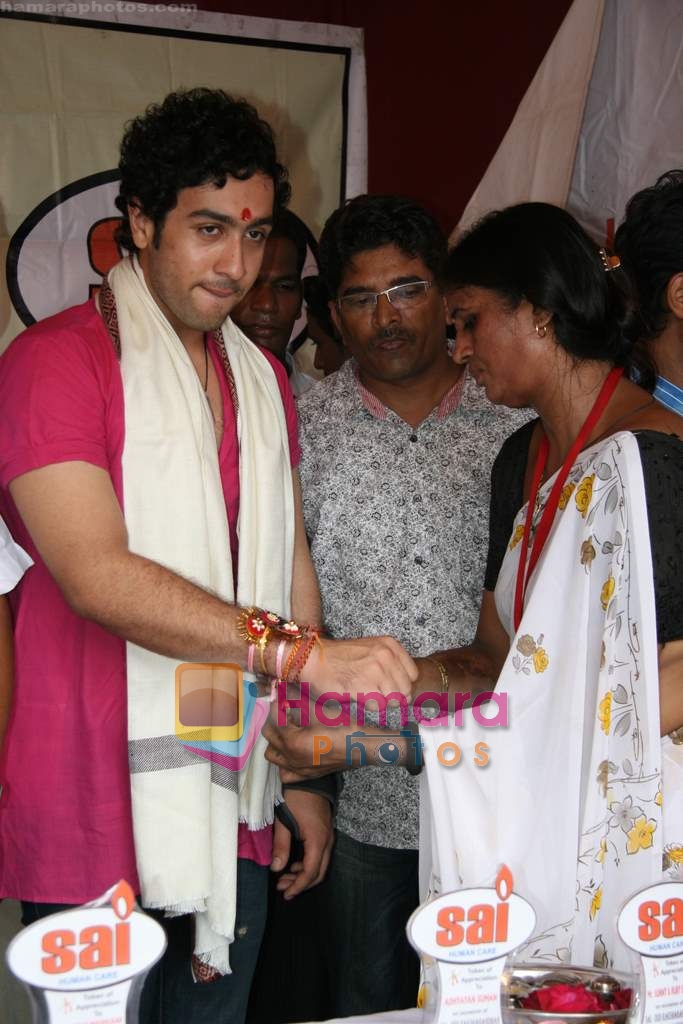 Adhyayan Suman celebrates rakshabandhan at Mumbai red light area on 4th Aug 2009 