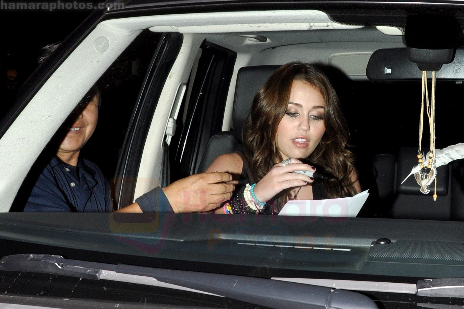 Miley Cyrus leaving Katsu-Ya sushi restaurant with friends in Studio City, California on 25th August 2009 - IANS-WENN 