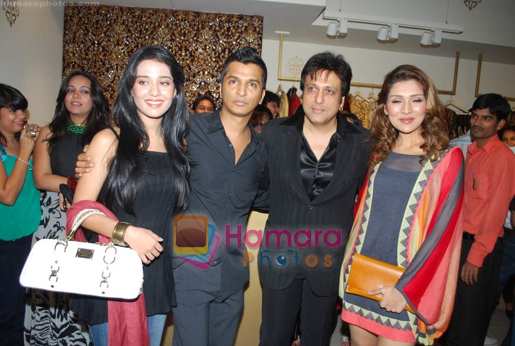 Amrita Rao, Govinda, Vikram Phadnis at the Launch of VIKRAM PHADNIS boutique with Malaga  launches his exclusive boutique in Juhu on 12th Dec 2009 