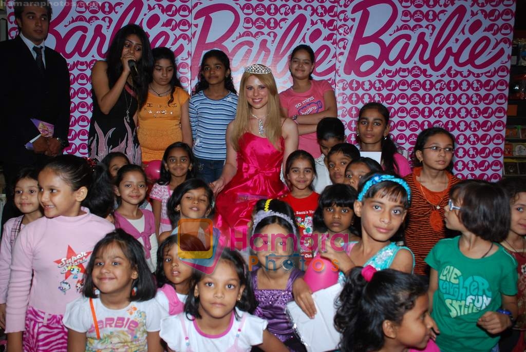 Barbie celebrates Christmas with children in Landmark, Infinity Mall on 24th Dec 2009 