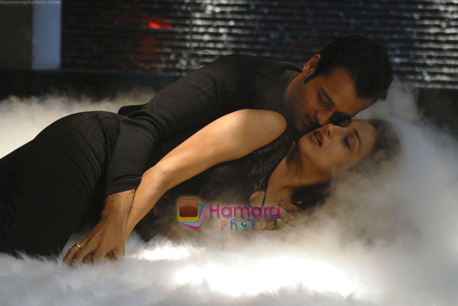 Rituparna Sengupta, Rohit Roy in the still from movie Mittal Vs Mittal 