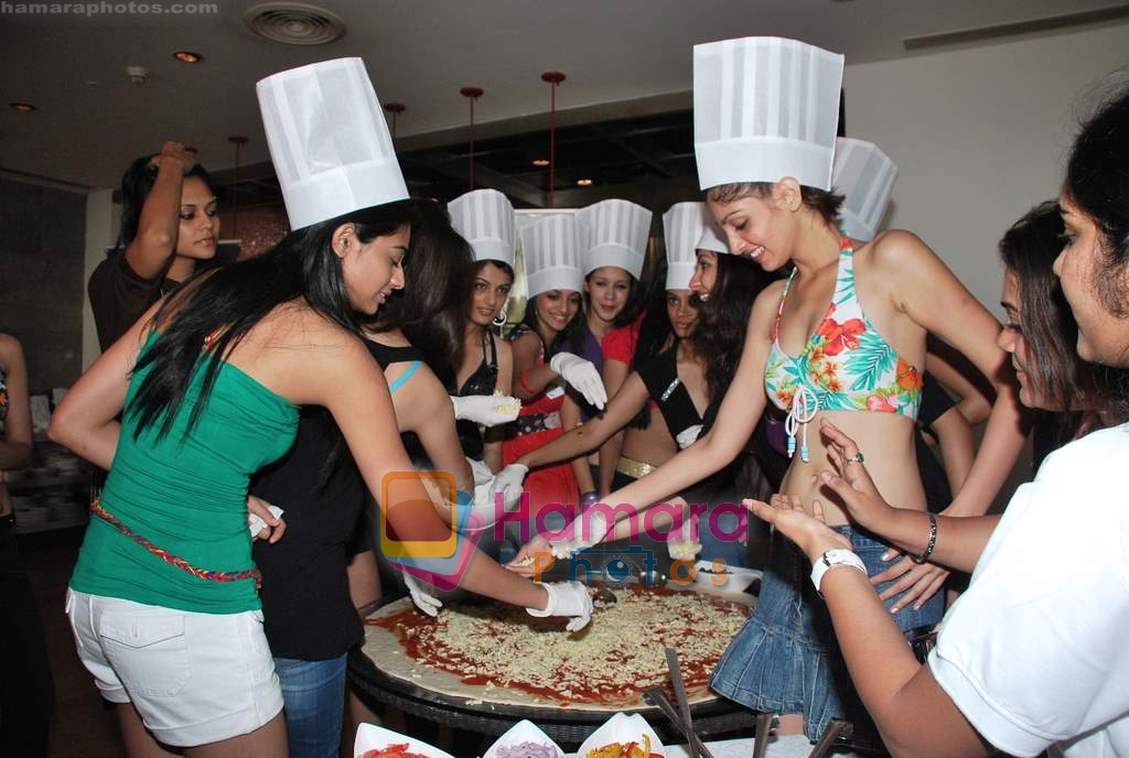 Femina Miss India finalists make giant pizza in Novotel Hotel, Juhu on 7th April 2010 
