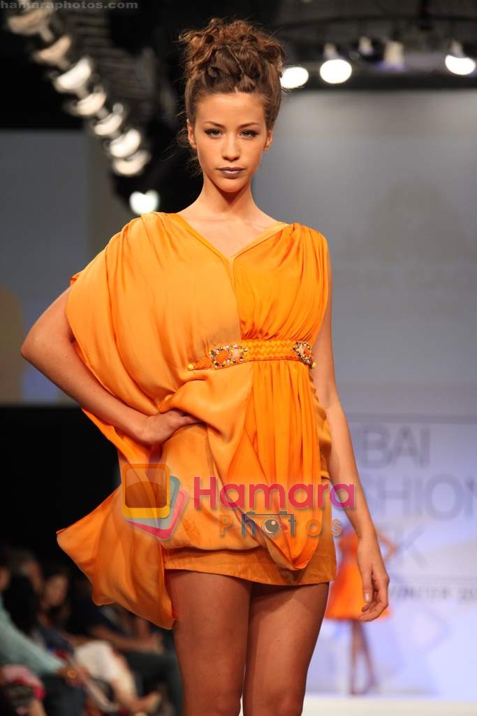 Model walks the ramp for Nisha Sagar in Dubai Fashion Week 2010 on 10th April 2010 