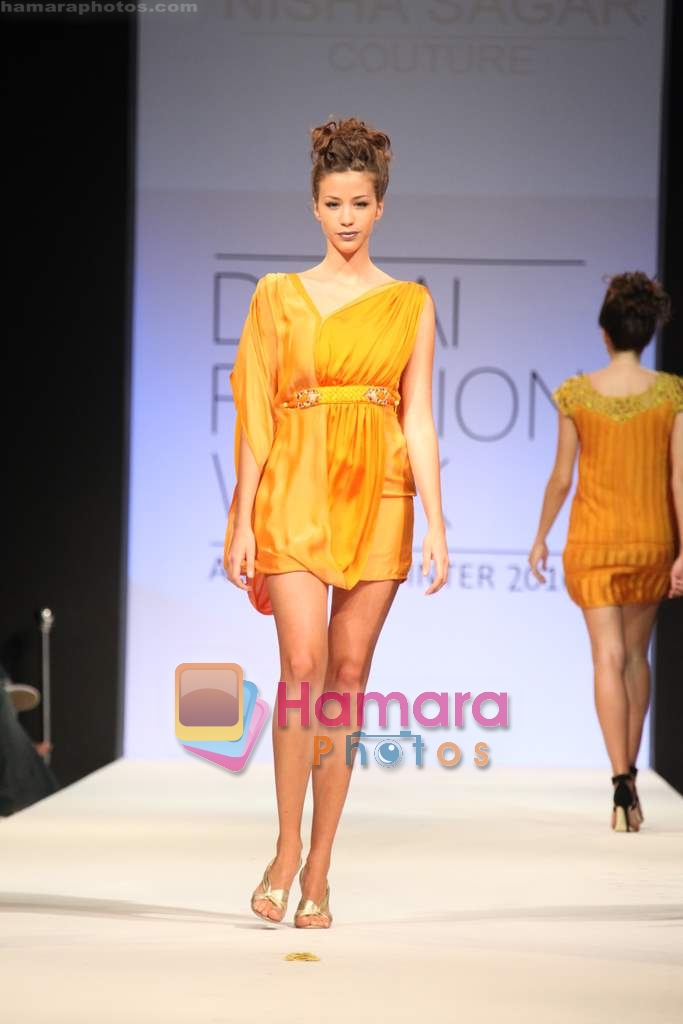 Model walks the ramp for Nisha Sagar in Dubai Fashion Week 2010 on 10th April 2010 