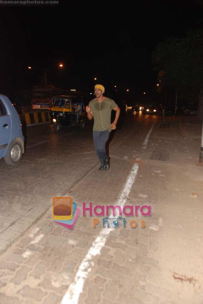 Arjun Rampal jogging on road in Bandra on 29th April 2010 