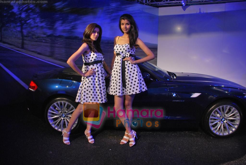 Models promote new BMW CAR in Grand Hyatt on 12th May 2010 
