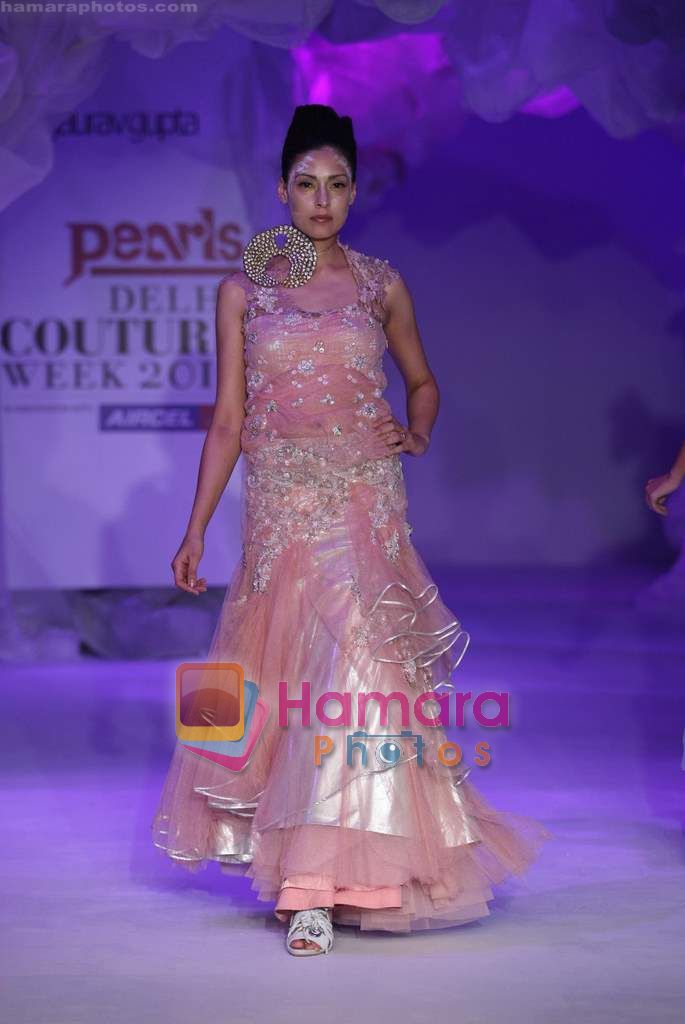 Model walk the ramp for Gaurav Gupta Show at Pearls Delhi couture week on 25th July 2010 