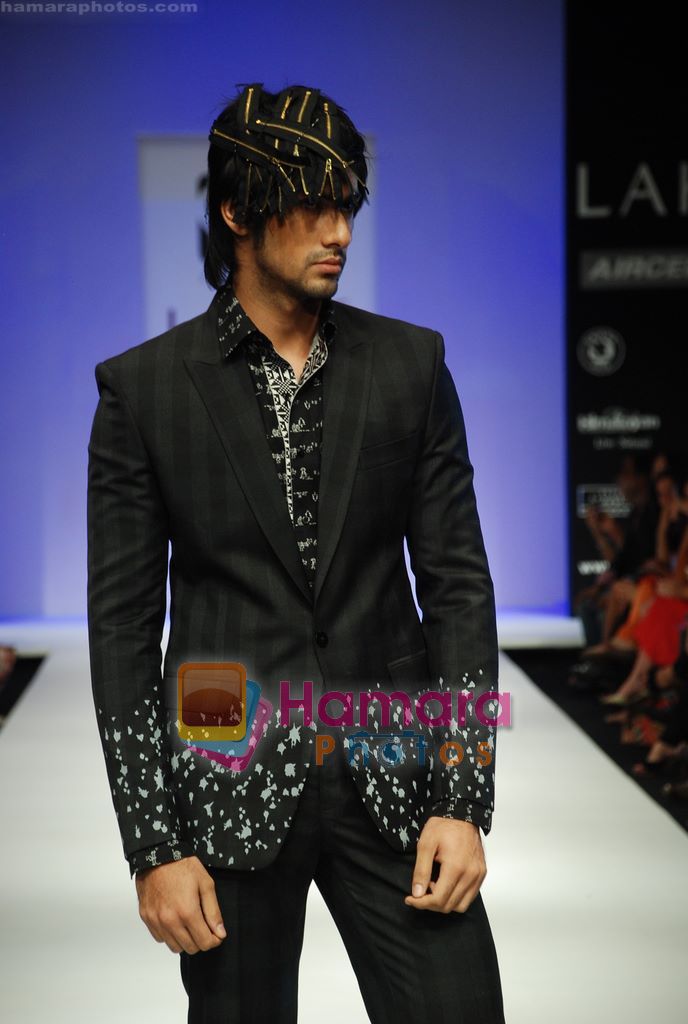 Model walks the ramp for Sanjay Hingu Show at Lakme Winter fashion week day 3 on 19th Sept 2010 