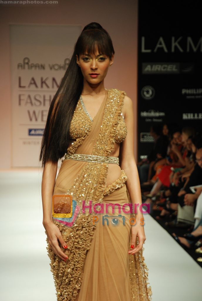 Model walks the ramp for Arpan Vohra Show at Lakme Winter fashion week day 3 on 19th Sept 2010 