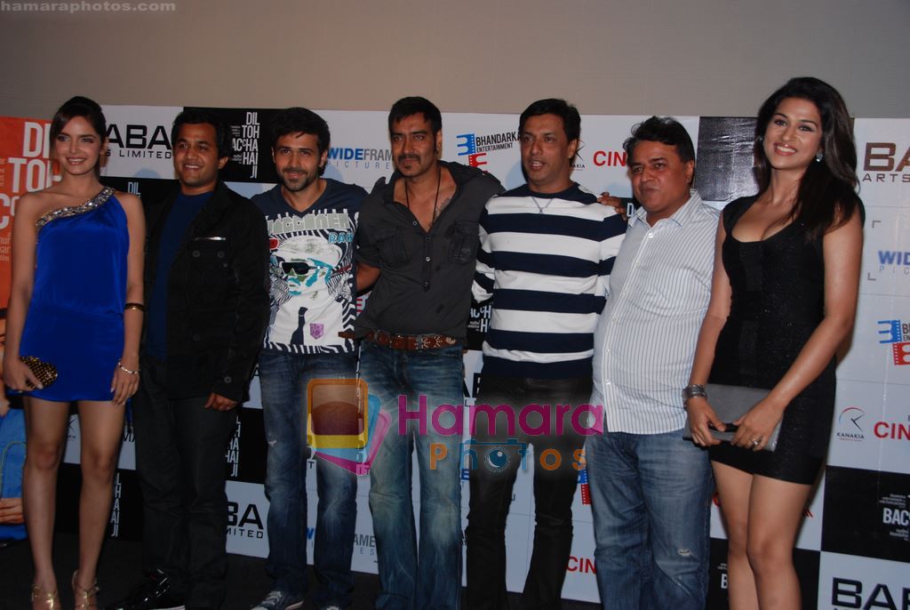 Ajay Devgan, Emraan Hashmi, Omi Vaidya, Madhur Bhandarkar, Shazahn Padamsee, Shraddha Das, Kumar Mangat at Dil Toh Baccha Hai Ji first look launch in Cinemax, Mumbai on 27th Nov 2010 