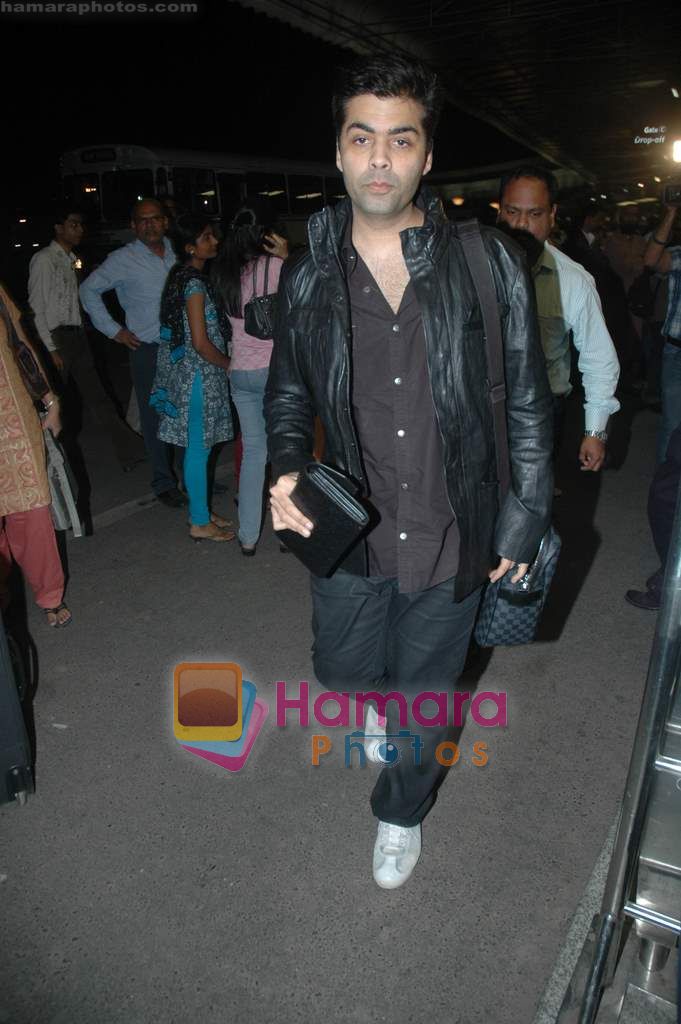 Karan Johar leave for Zee Awards in Singapore in Mumbai Airport on 12th Jan 2011 