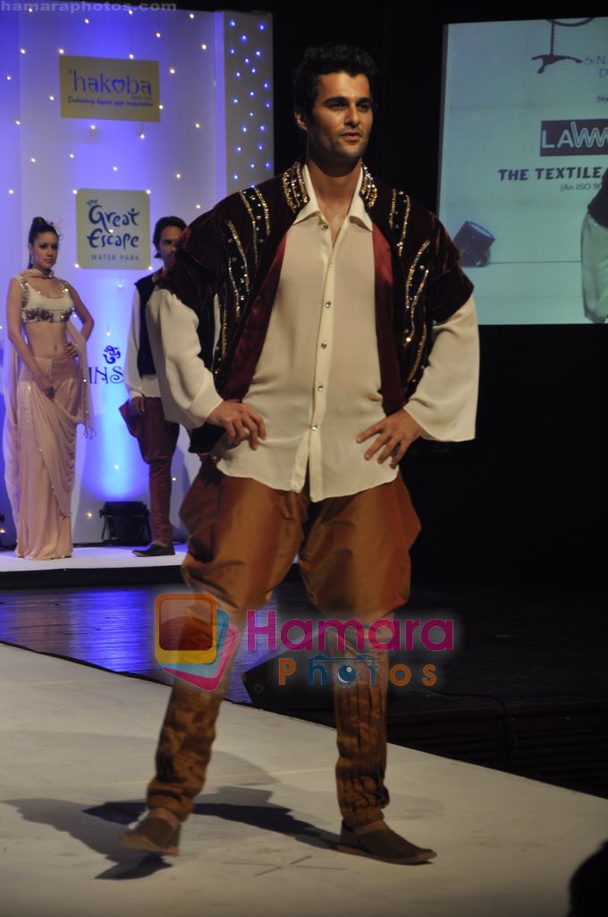 Model walk the ramp at The Annual SNDT college fashion showcase in  St Andrews, Bandra, Mumbai on 23rd Feb 2011 