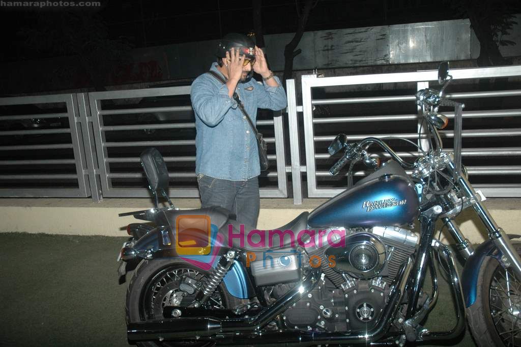 Arshad Warsi on his Harley bike with wife Maria as they went to watch The King's Speech on 8th March 2011