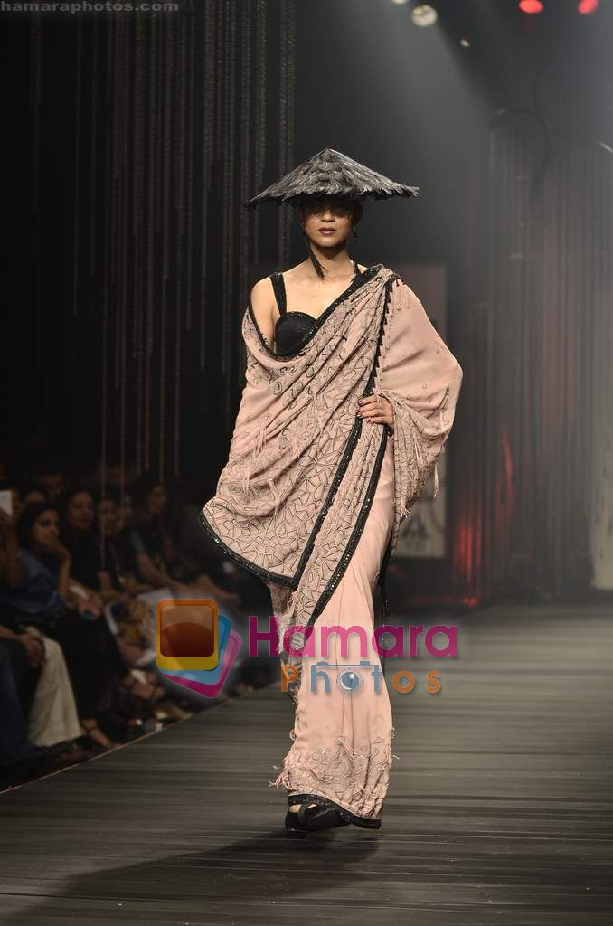 Model walks the ramp at Tarun Tahiliani's show on Wills Lifestyle India Fashion Week 2011 - Day 1 in Delhi on 6th April 2011 