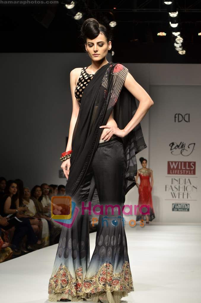 Model walks the ramp for Dolly J show on Wills Lifestyle India Fashion Week 2011 - Day 2 in Delhi on 7th April 2011 
