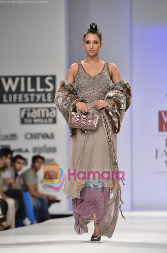 Model walks the ramp for Geisha Designs show on Wills Lifestyle India Fashion Week 2011 - Day 1 in Delhi on 6th April 2011 
