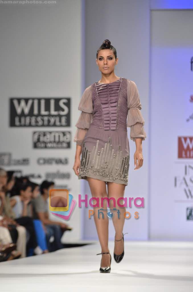 Model walks the ramp for Geisha Designs show on Wills Lifestyle India Fashion Week 2011 - Day 1 in Delhi on 6th April 2011 