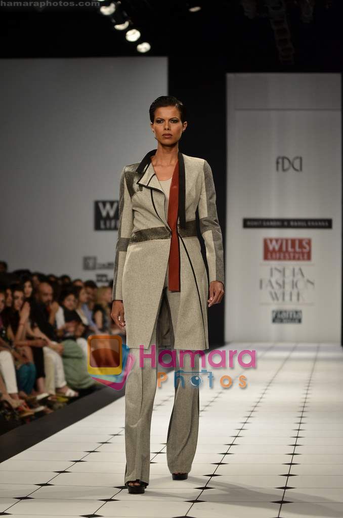 Model walks the ramp for Rohit Gandhi and Rahul Khanna show on Wills Lifestyle India Fashion Week 2011 - Day 3 in Delhi on 8th April 2011 