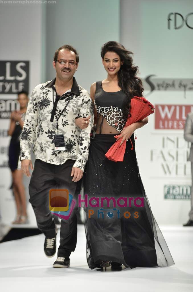Sonal Chauhan walks the ramp for Sylph By Sadan show on Wills Lifestyle India Fashion Week 2011 � Day 4 in Delhi on 9th April 2011 