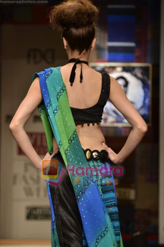 Model walks the ramp for Niki Mahajan show on Wills Lifestyle India Fashion Week 2011-Day 4 in Delhi on 9th April 2011 
