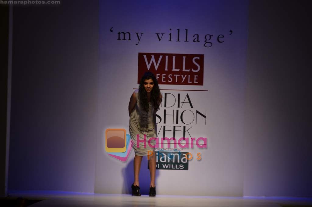 Model walks the ramp for My Village show on Wills Lifestyle India Fashion Week 2011-Day 4 in Delhi on 9th April 2011
