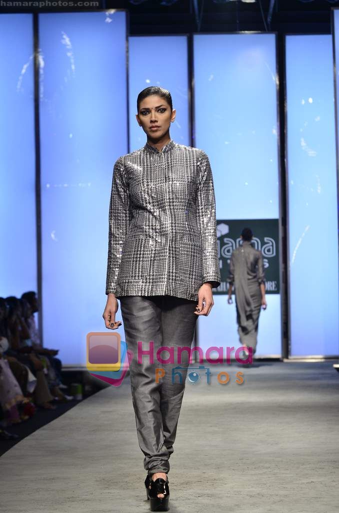 Model walks the ramp for Abraham and Thakore show on Wills Lifestyle India Fashion Week 2011-Day 4 in Delhi on 9th April 2011 