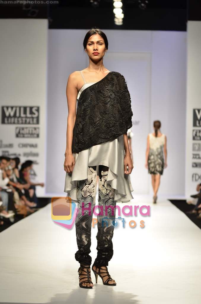 Model walks the ramp for Ritesh Kumar show on Wills Lifestyle India Fashion Week 2011-Day 5 in Delhi on 10th April 2011 