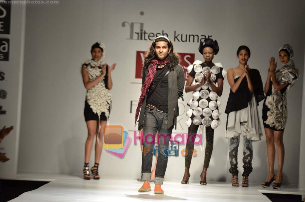 Model walks the ramp for Ritesh Kumar show on Wills Lifestyle India Fashion Week 2011-Day 5 in Delhi on 10th April 2011